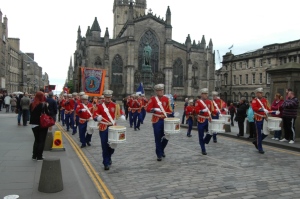 Random marching band coming down the Royal Mile, Edinburgh, Scotland